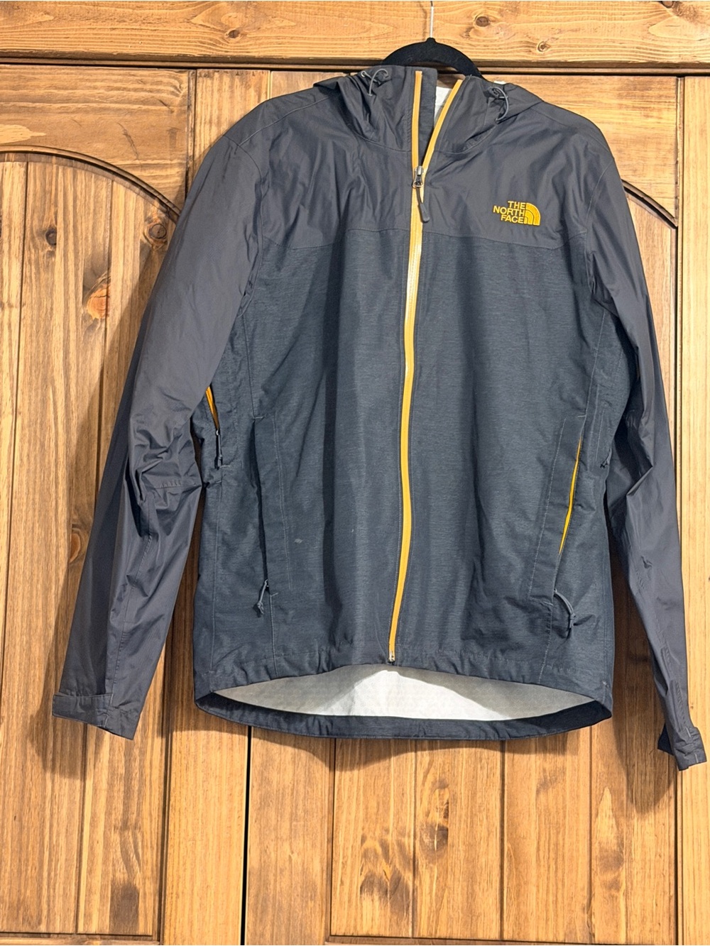 The North Face Men's Dark Gray Rain Jacket with Yellow Trim